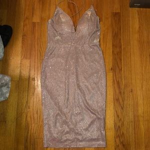 A shiny pink bodycon dress